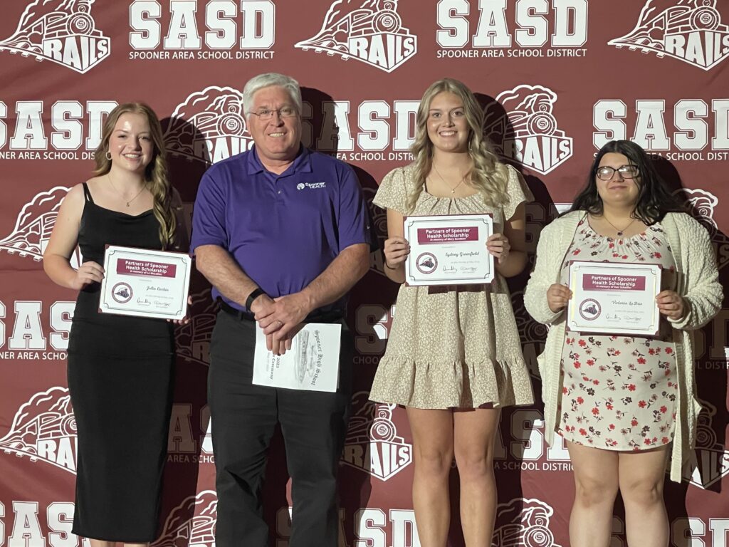 2023 Scholarship Recipients: Julia Corbin, Sydney Greenfield and Victoria LaBrie pictured with Mike Schafer, CEO of Spooner Health