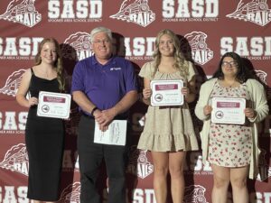 2023 Scholarship Recipients: Julia Corbin, Sydney Greenfield and Victoria LaBrie pictured with Mike Schafer, CEO of Spooner Health